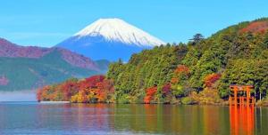 a mountain in the background with a lake at Your Bedroom Hakone in Odawara +15 photos