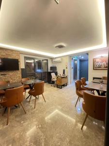 TV a/nebo společenská místnost v ubytování Artelist Hotel