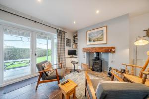 TV a/nebo společenská místnost v ubytování Curragho