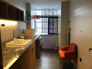 Kuchyň nebo kuchyňský kout v ubytování Sofitel Fuzhou Pop Hotel