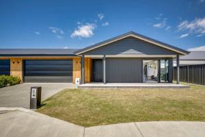 a rendering of a house with a garage at Quiet on Cassin - Taradale in Napier