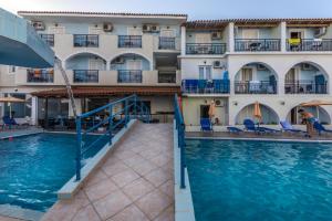 a view of the pool at a hotel at Vossos Hotel Apartments in Laganas
