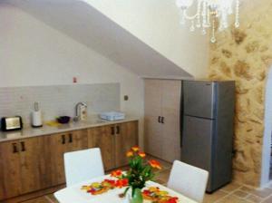 Dapur atau dapur kecil di Doga Apartment
