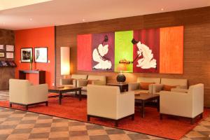 Posezení v ubytování Pestana Tropico Ocean & City Hotel
