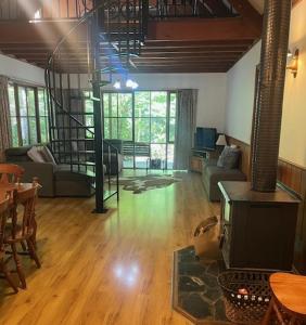 Χώρος καθιστικού στο Goulburn River Cottage