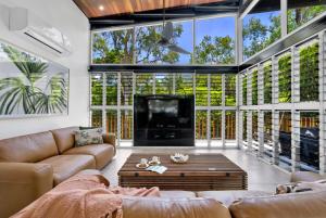 Гостиная зона в Belle Escapes Rainforest Shore