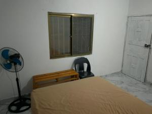 Ένα ή περισσότερα κρεβάτια σε δωμάτιο στο Casa Branca Alegre de Chidenguele