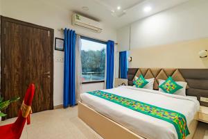 Ένα ή περισσότερα κρεβάτια σε δωμάτιο στο Treebo KGF Villa +65 φωτογραφίες