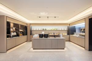 Η κουζίνα ή μικρή κουζίνα στο JI Hotel Shanghai Railway Station South Square