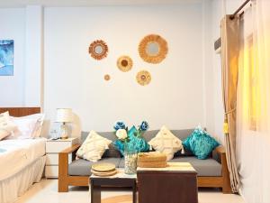 Ένα ή περισσότερα κρεβάτια σε δωμάτιο στο Cozy Tropical +13 φωτογραφίες