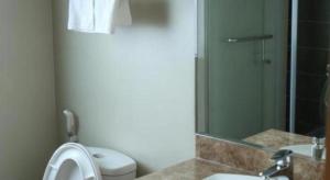 a bathroom with a toilet and a sink and a shower at Nhat Vy Hotel in Ấp Ða Lợi +134 photos