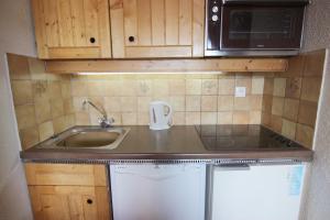 Kuchyň nebo kuchyňský kout v ubytování Eterlous Appartements VTI