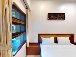 a bedroom with two beds and a window at Lucky Mother Bungalow in Chaweng +135 photos