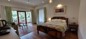 Ένα ή περισσότερα κρεβάτια σε δωμάτιο στο Morjim Plaza