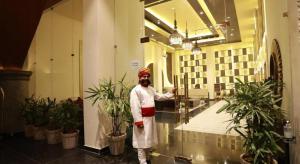 a man standing in front of a lobby at A N Studio Room, The Grand Anukampa in Jaipur +41 photos
