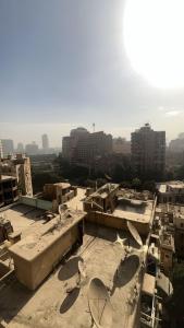 a view from the top of a building with satellite at Doki sky suite in Cairo