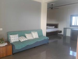 O zonă de relaxare la OYO Hotel O Shiv Shree Dham +9 fotografii