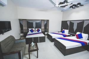 Ένα ή περισσότερα κρεβάτια σε δωμάτιο στο The Hotel Region