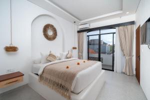 Ένα ή περισσότερα κρεβάτια σε δωμάτιο στο 3Bedrooms Escape Villa Legian Near Doublesix Beach +41 φωτογραφίες