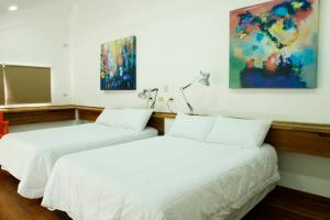 Postel nebo postele na pokoji v ubytování Casa Taller Ramirez + 26 fotografií