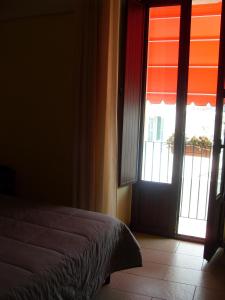 Postel nebo postele na pokoji v ubytování B&B Frammenti D'Itria