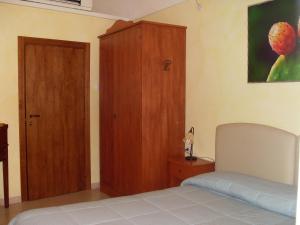 Postel nebo postele na pokoji v ubytování B&B Frammenti D'Itria
