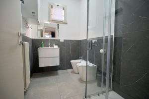 Ένα μπάνιο στο Teodorico 21 Center & Comfort