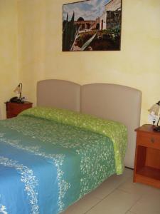 Postel nebo postele na pokoji v ubytování B&B Frammenti D'Itria