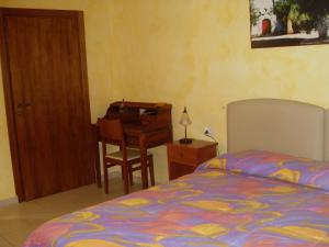 Postel nebo postele na pokoji v ubytování B&B Frammenti D'Itria