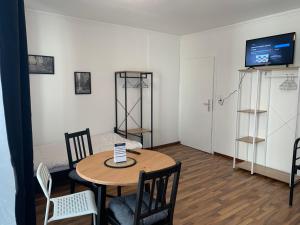 Телевизор и/или развлекательный центр в Villa Porta Westfalica 2