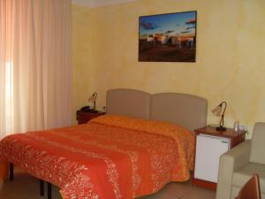 Postel nebo postele na pokoji v ubytování B&B Frammenti D'Itria