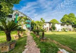 Κήπος έξω από το Happy Home Đồng Bèn