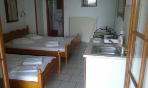 A bed or beds in a room at Anastasia