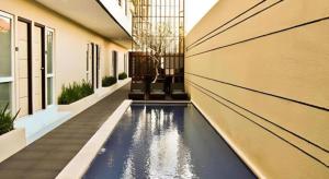 Πισίνα στο ή κοντά στο Eazy Suite Legian