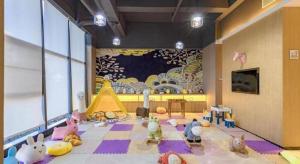 TV a/nebo společenská místnost v ubytování ibis Styles Kunming Nanping Hotel