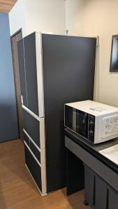 Кухня или мини-кухня в Nest SETSUGEN Villa
