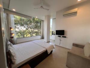 Postel nebo postele na pokoji v ubytování Hotel Golden Leaf