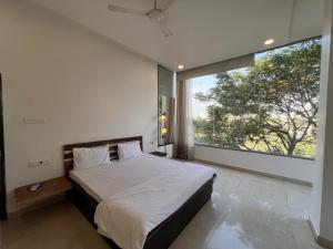 Postel nebo postele na pokoji v ubytování Hotel Golden Leaf