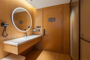 Et badeværelse på JI Hotel Nanjing National Agricultural Innovation Center + 28 billeder