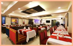 Et tv og/eller underholdning på Hotel The Silver Inn Mumbai