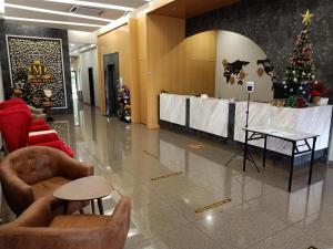 Posezení v ubytování M GLOBAL HOTEL