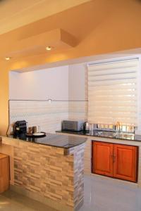 Kuchyň nebo kuchyňský kout v ubytování Betimu Residence