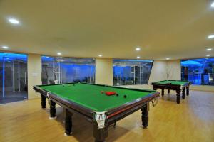 a room with two pool tables in a room at Enrise by Sayaji Bhopal in Bhopal