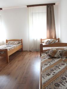 Postel nebo postele na pokoji v ubytování Hostel S