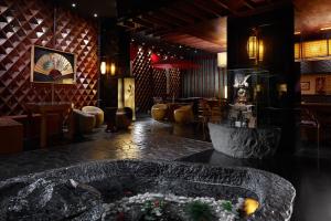 Лаундж или бар в ZiQoo Hotel Apartments Dubai