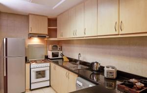 Dapur atau dapur kecil di ZiQoo Hotel Apartments Dubai