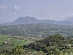 a view of a valley with mountains in the distance at Masseria Marotta Appartamento in Santa Paolina