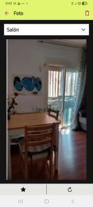 a picture of a dining room with a wooden table at villa Amparo in Villaviciosa de Odón