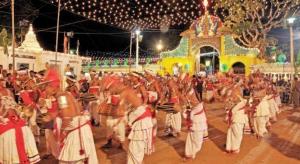 a group of people dancing in front of a carnival at Hotel camorich in Debarawewa