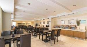 Posezení v ubytování Jinjiang Inn Select Qingdao West Coast Coach Exhibition Center High-Speed Railway Station